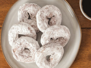 12 Powdered Sugar Apple Cider Donuts